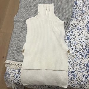 beige turtleneck with cutouts